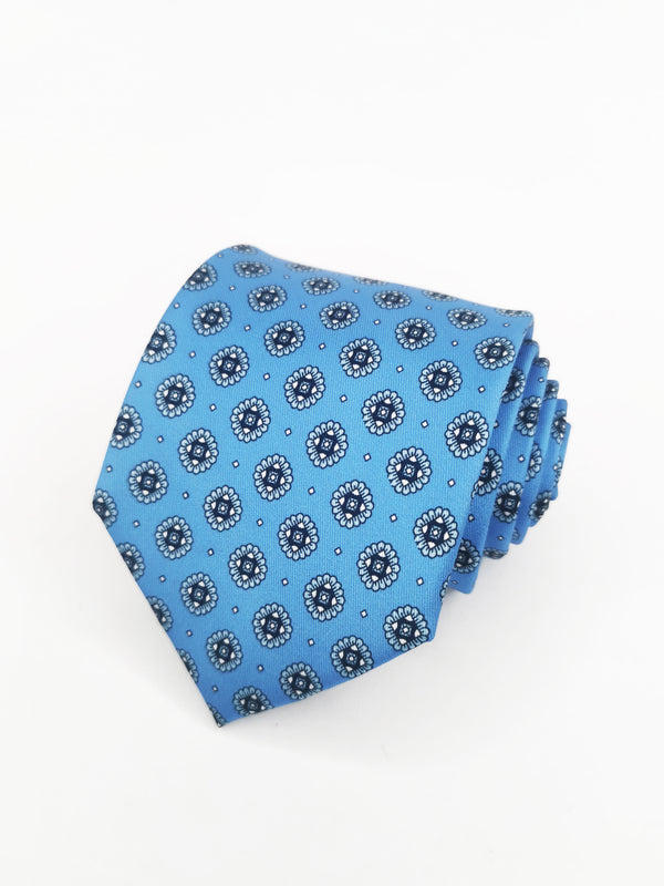 Corbata celeste con rosetas azules